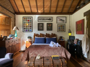 Casa com riacho e jardim particular próximo ao rio